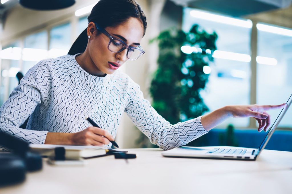 Woman looking through statements