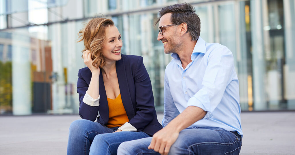 Couple chatting outside