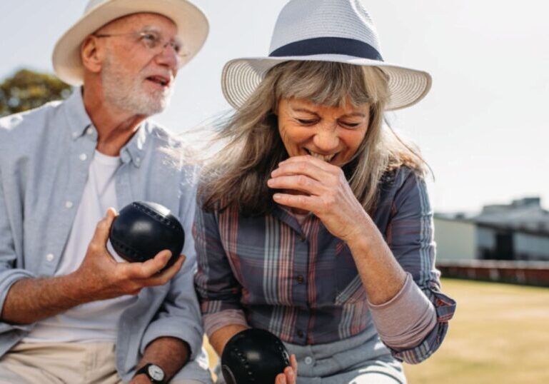 Retirees laughing outside