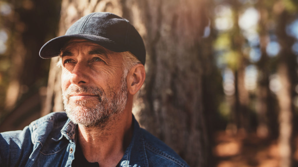 Man looking out into peaceful future