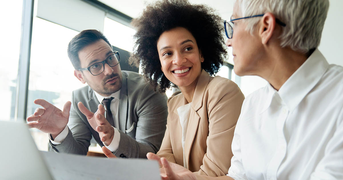 Collaboration and analysis by group of business people working in office