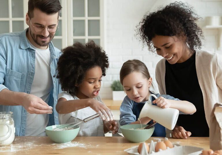 Blended family has fun together in the kitchen