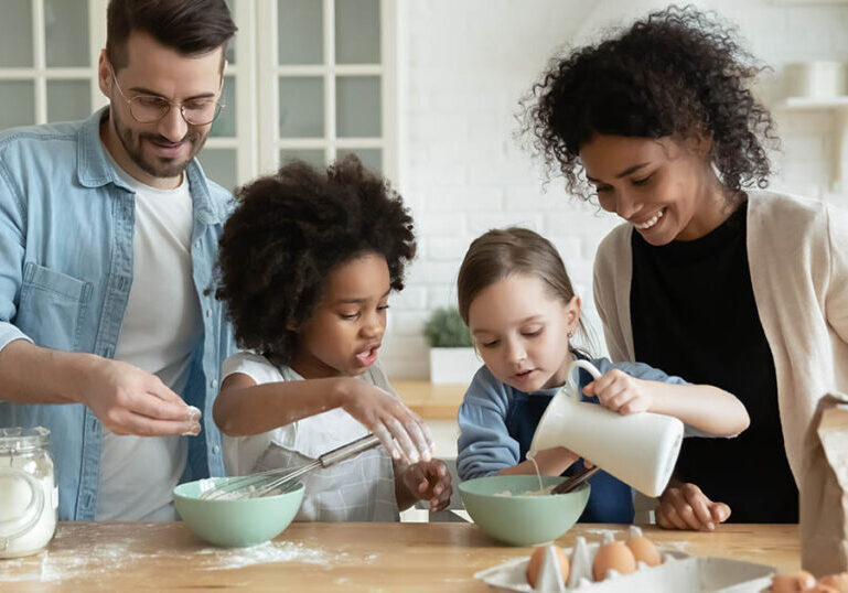Blended family has fun together in the kitchen